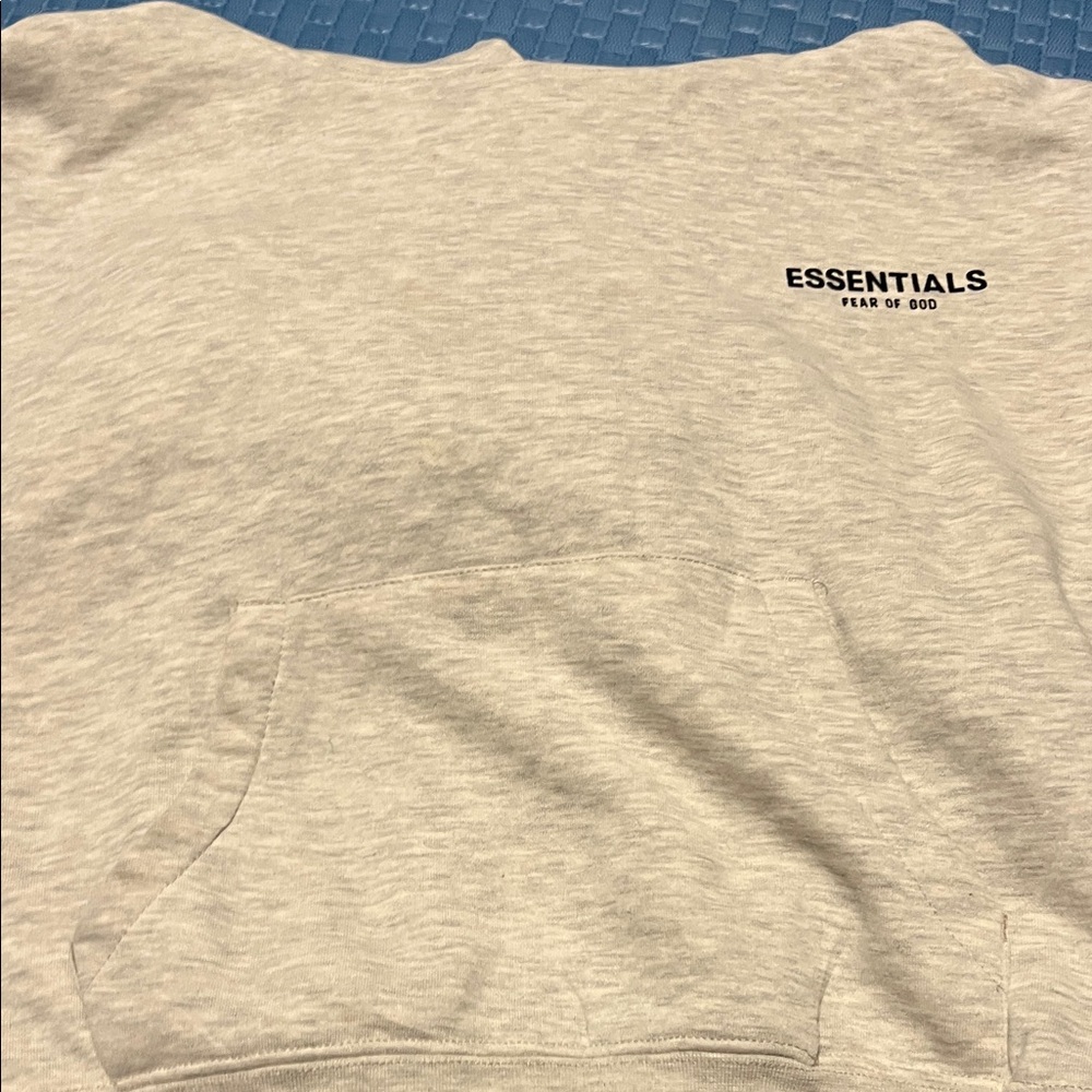 Essentials Light Oatmeal Hoodie Kids Size 10 YO L Used Good Condition has flaws